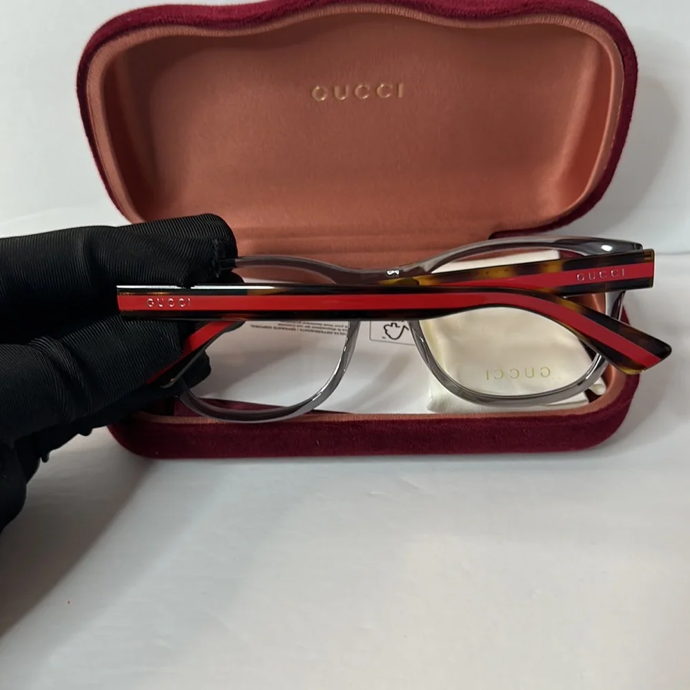New- Auth - Gucci's GG0004ON soft lines across frames front.Iconic web effect…